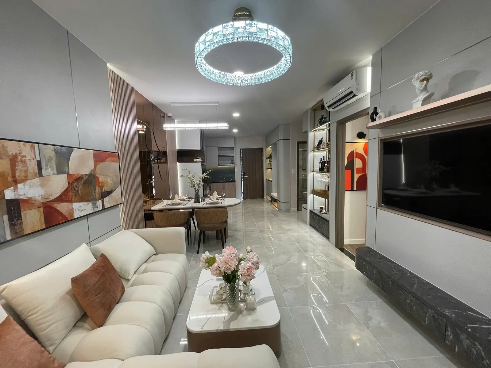 Phòng khách nhà mẫu căn B4 Bcons Central Park – ảnh chụp thực tế